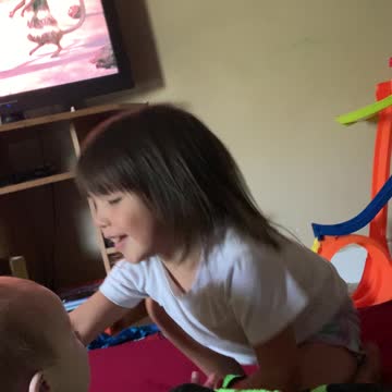 Sweet Sister Makes Baby Sister Laugh