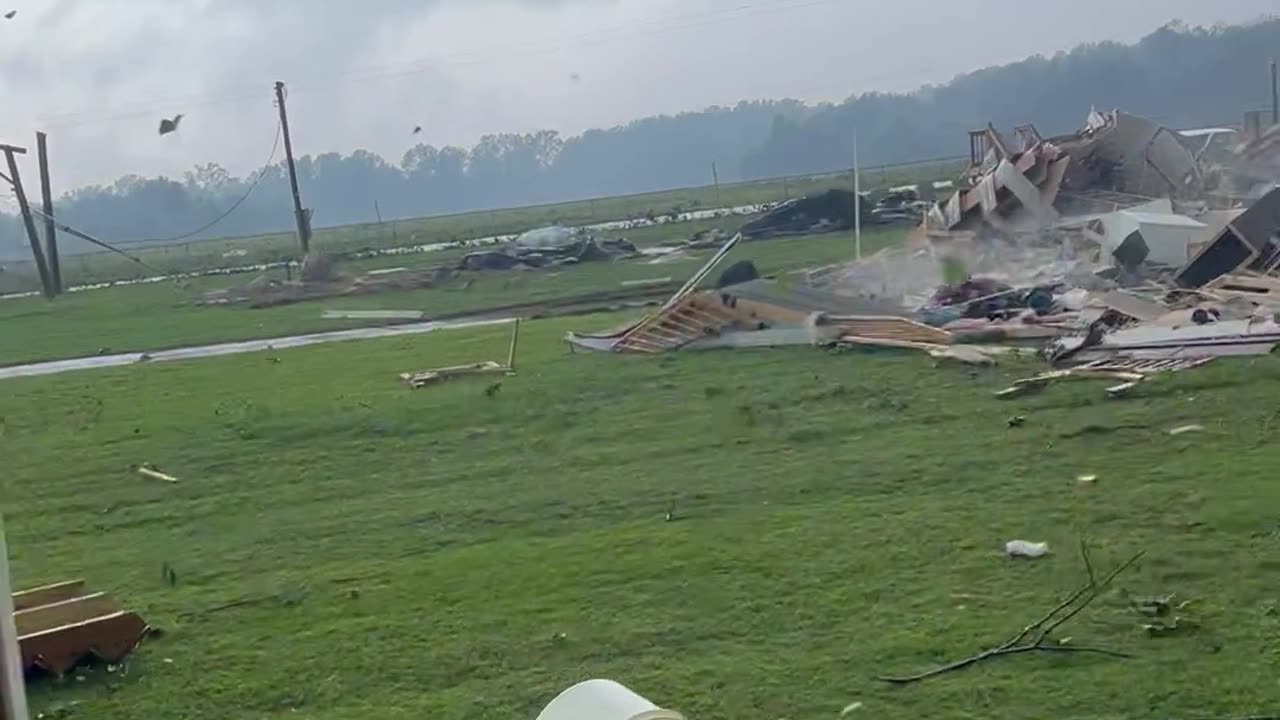 Tornado Winds Destroy Roofs and Scatter Debris