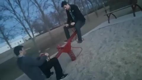 Seesaw Breaks While Guys Swing on It