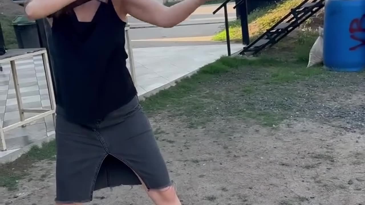 Beautiful girl use the shotgun