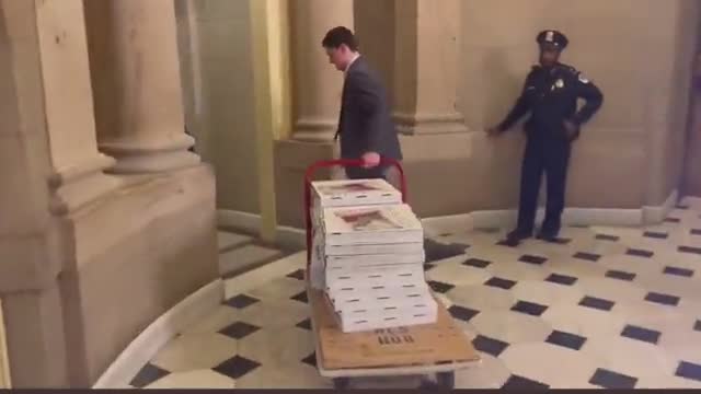 Pizza on the way to McCarthy’s office. Looks like this is going to be a long night.