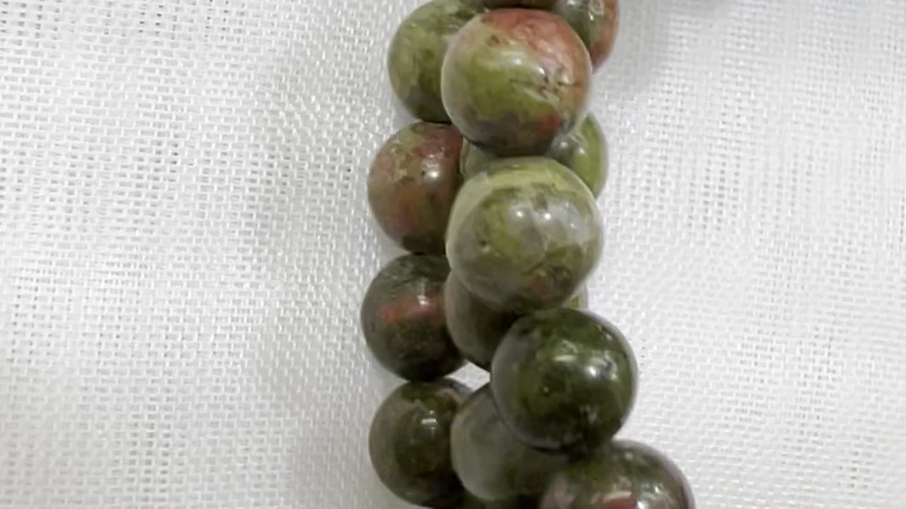 Handmade Unique 7” Bracelet with 6mm Unakite and Cross filled by Crystals