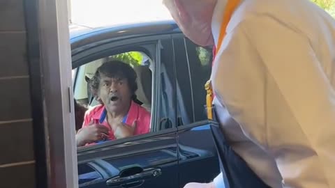 Donald Trump serving up some seriously happy customers at a McDonalds in Pennsylvania