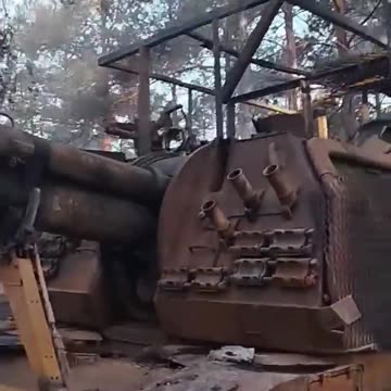 Russian soldiers checking out their 2S19M2 Msta-S after being destroyed by a baba yaga drone