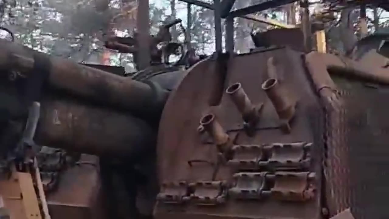 Russian soldiers checking out their 2S19M2 Msta-S after being destroyed by a baba yaga drone