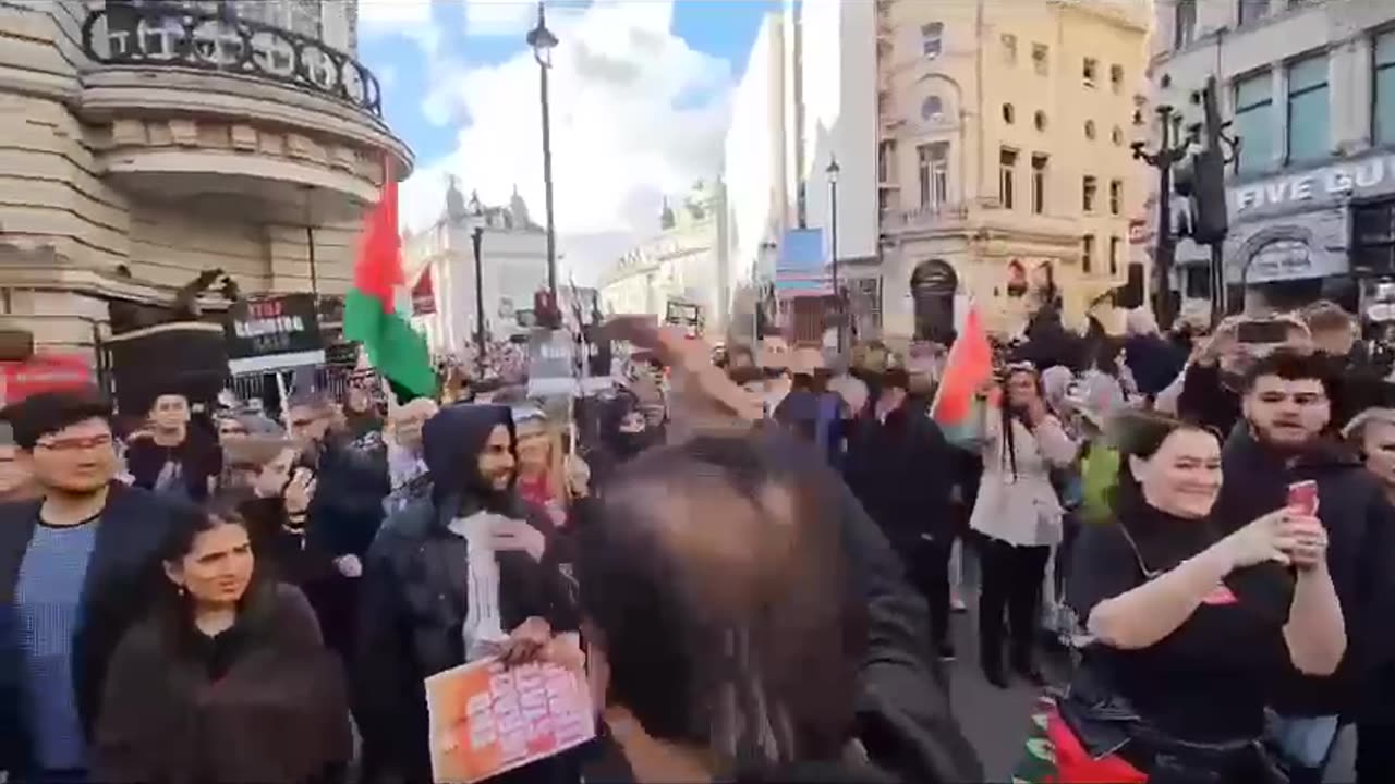 Patriots flying the England flag in London today are attacked by