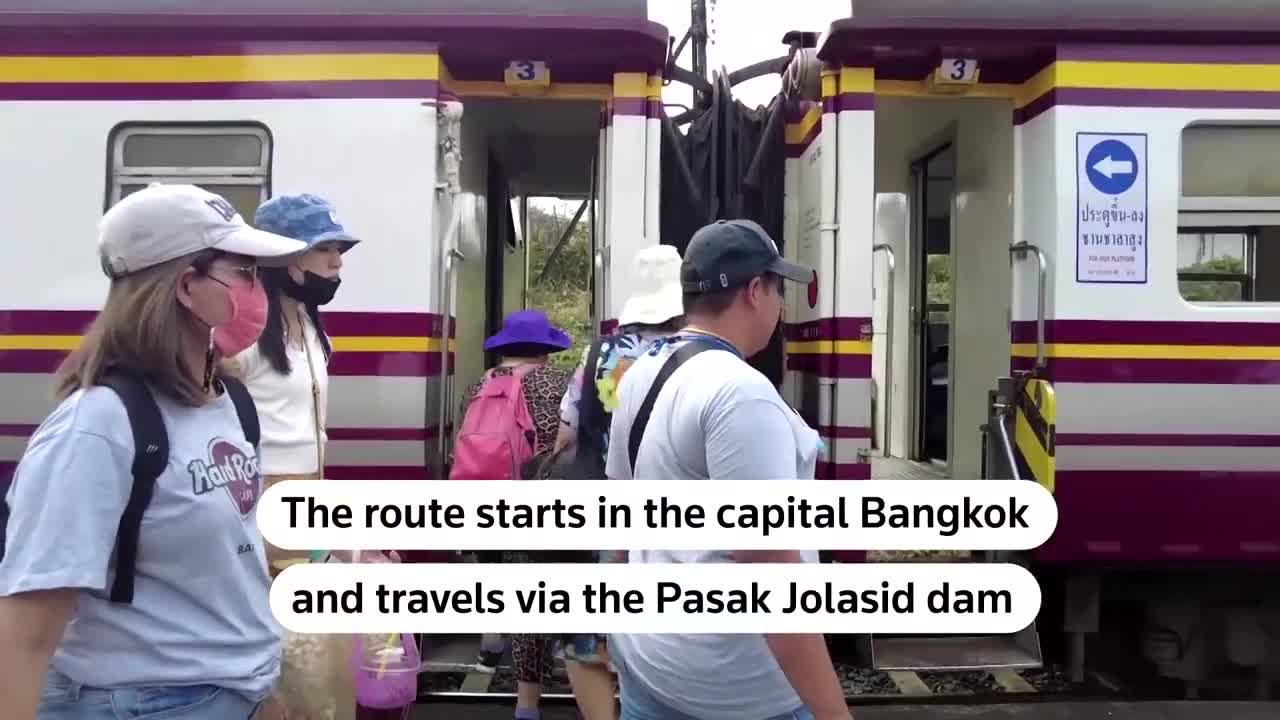 Thailand's 'floating train' a hit as dam waters rise