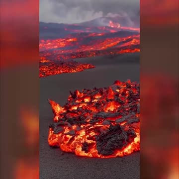 Awe-inspiring footage showing lava flowing on the Spanish island of La Palma.