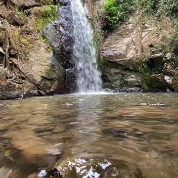 Small waterfall in village