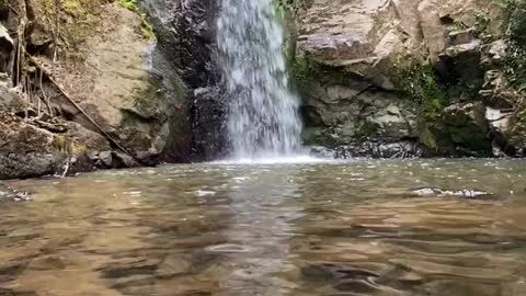 Small waterfall in village