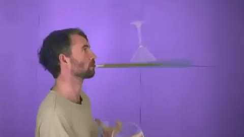 Guy Shows Unique Juggling Trick With Martini Glasses And Mouth Stick