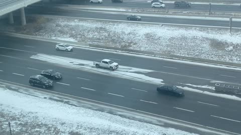 Truck Reverses Down Highway