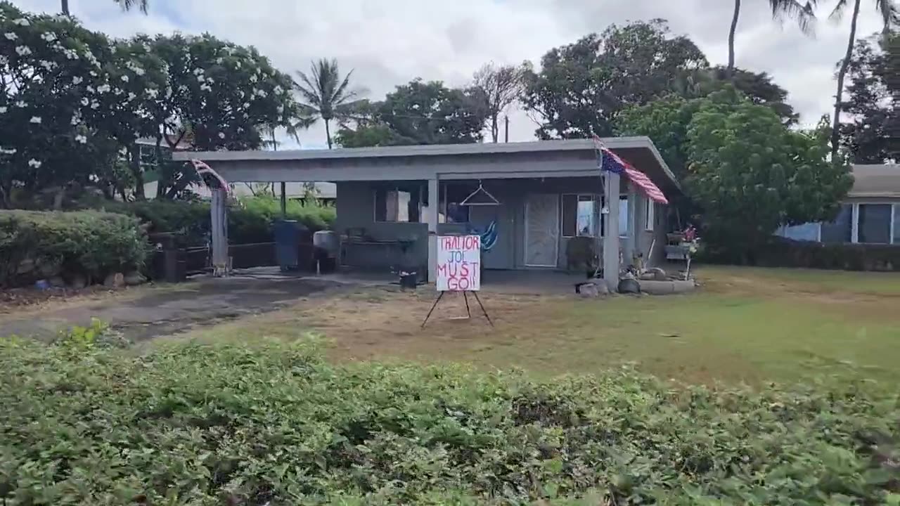 Maui resident displays a “Traitor Joe Must Go” sign in their lawn