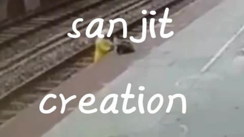 Woman crossing railway track save by inches in utharpradesh in india