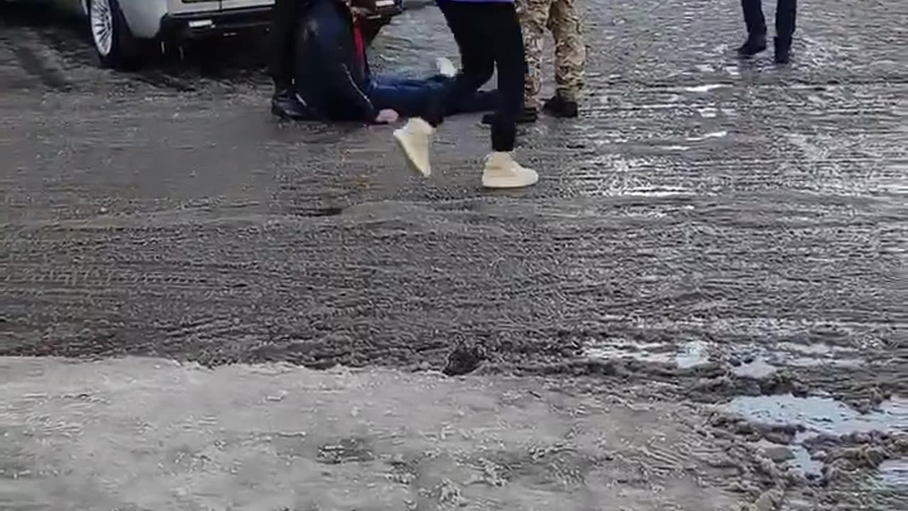 Forced conscription in Ukraine, dragging unconscious man into van