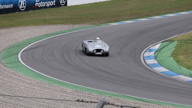 Cool Old Racing Car on Turn on Circuit