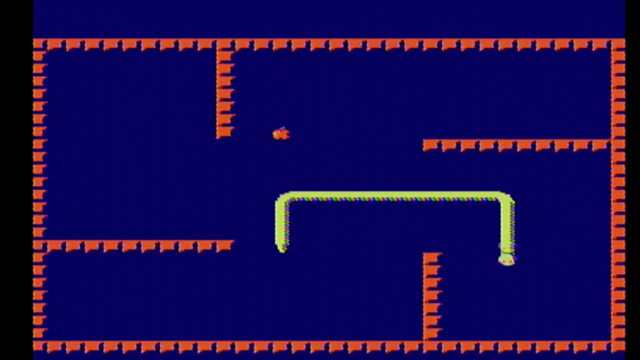 Playing Nibbles In Retro Game Console HD Video