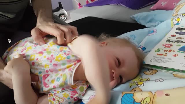 Baby's Hilarious Reaction to Getting Tickled