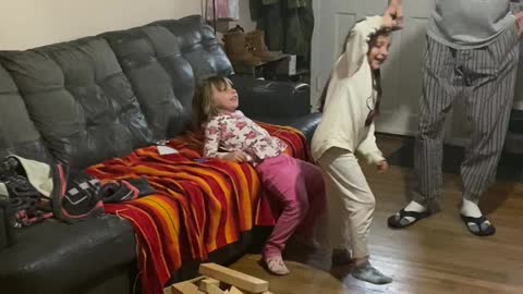 Toddler Twirls to the Floor