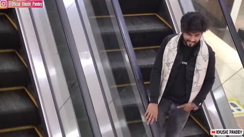 Pulling Strangers Cheek On Escalator