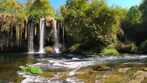 relaxing by the waterfall