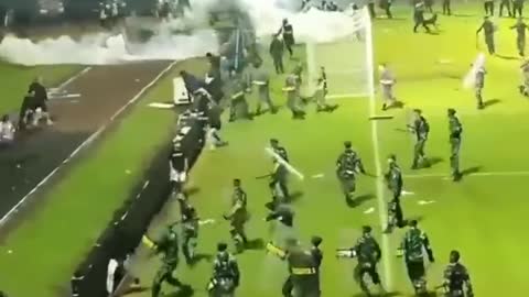 Indonesia News | Football Match | Fans Invade Pitch | Stampede at Indonesia Football Match |News18