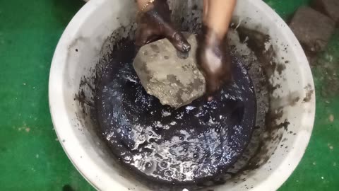 Pure charcoal crumbling in foaming water satisfying asmr