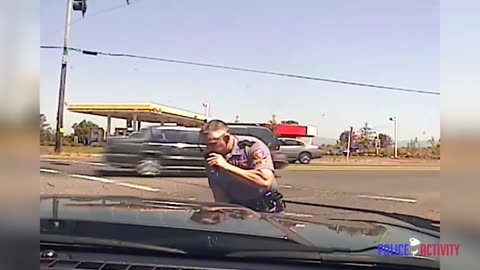 Dashcam Video Shows Oregon Cop Kicking Motorcyclist