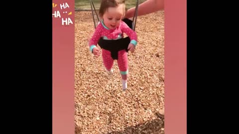 A fun moment for the baby to play on the swing