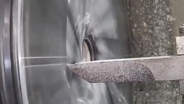 Automobile wheel hub grinding