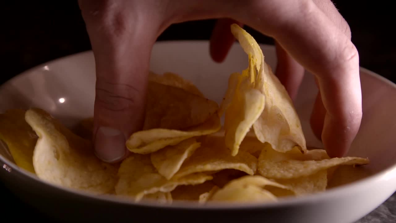 Grabbing Crisps Slow Motion