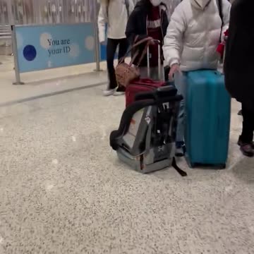 Passengers form long line at Dallas airport amid flight disruptions