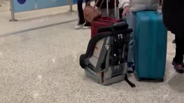 Passengers form long line at Dallas airport amid flight disruptions