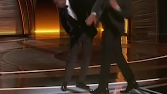 Will Smith slapping Chris Rock at the Oscars