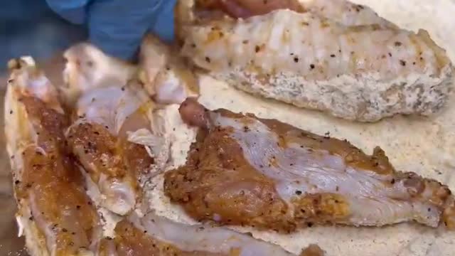 7-year-old chef prepares for fried chicken Friday.