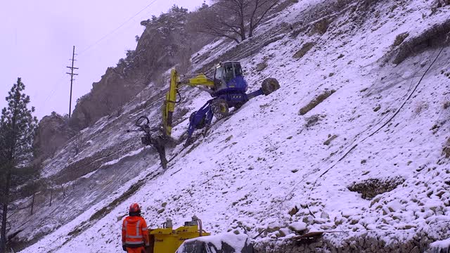 Spider Excavator Climbs Glenwood Canyon