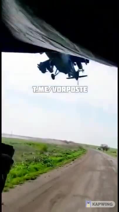 A Russian Mil Mi-24 helicopter gunship in persuit at extreme low altitude