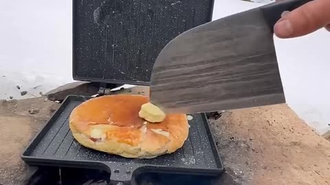 Sausage toast in winter camping