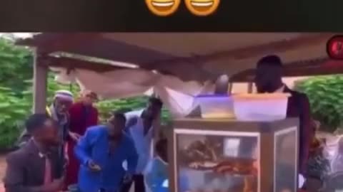 Ghana Man buying Beans