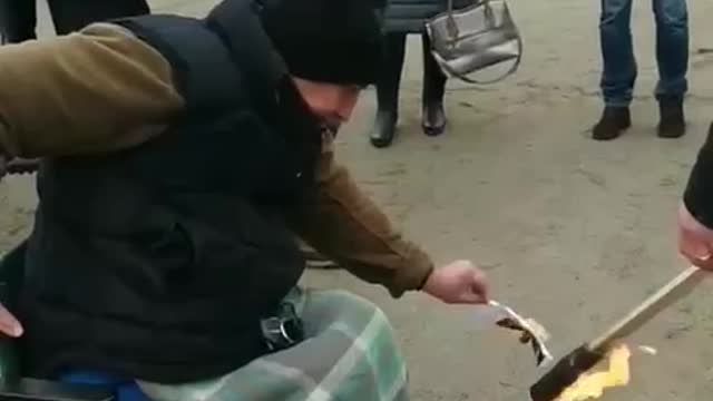 Zhitomir, Ukraine: Citizens burn energy bills to protest skyrocketing energy prices