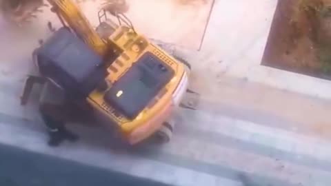 Looks like this excavator has his own plans for the day!.hd