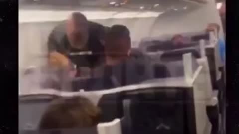 Mike Tyson kicks drunk guys ass on plane