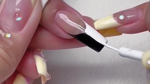 The ultimate simple black and white manicure