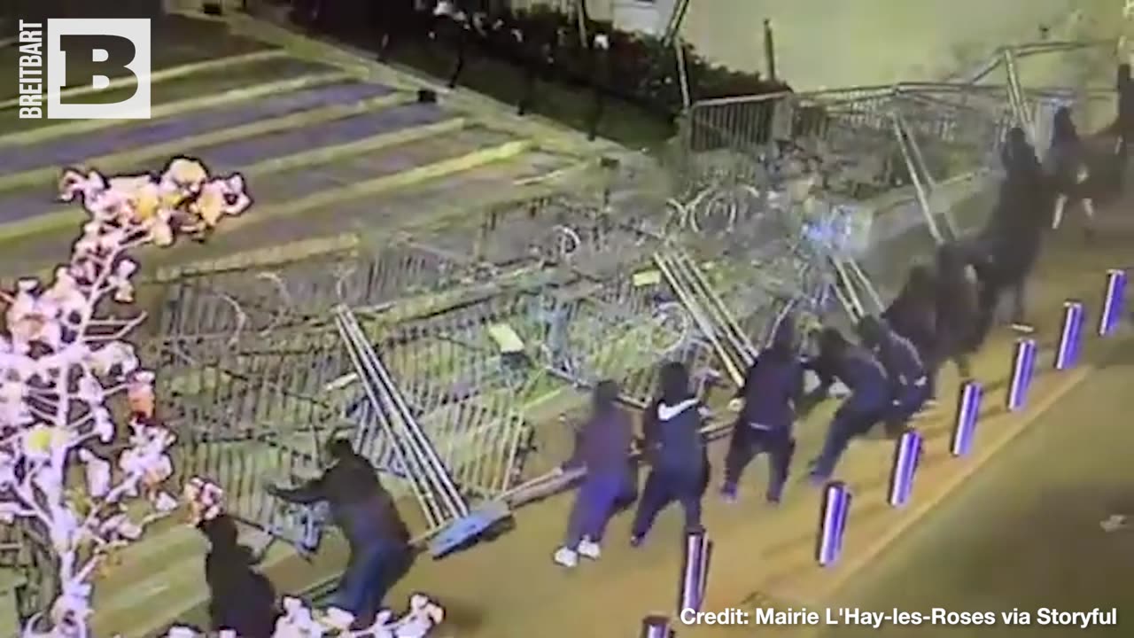 MON DIEU! French Protesters Try to Pull Down Barbed Wire from Town Hall