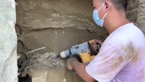 Turning a big rock into a beautiful House.