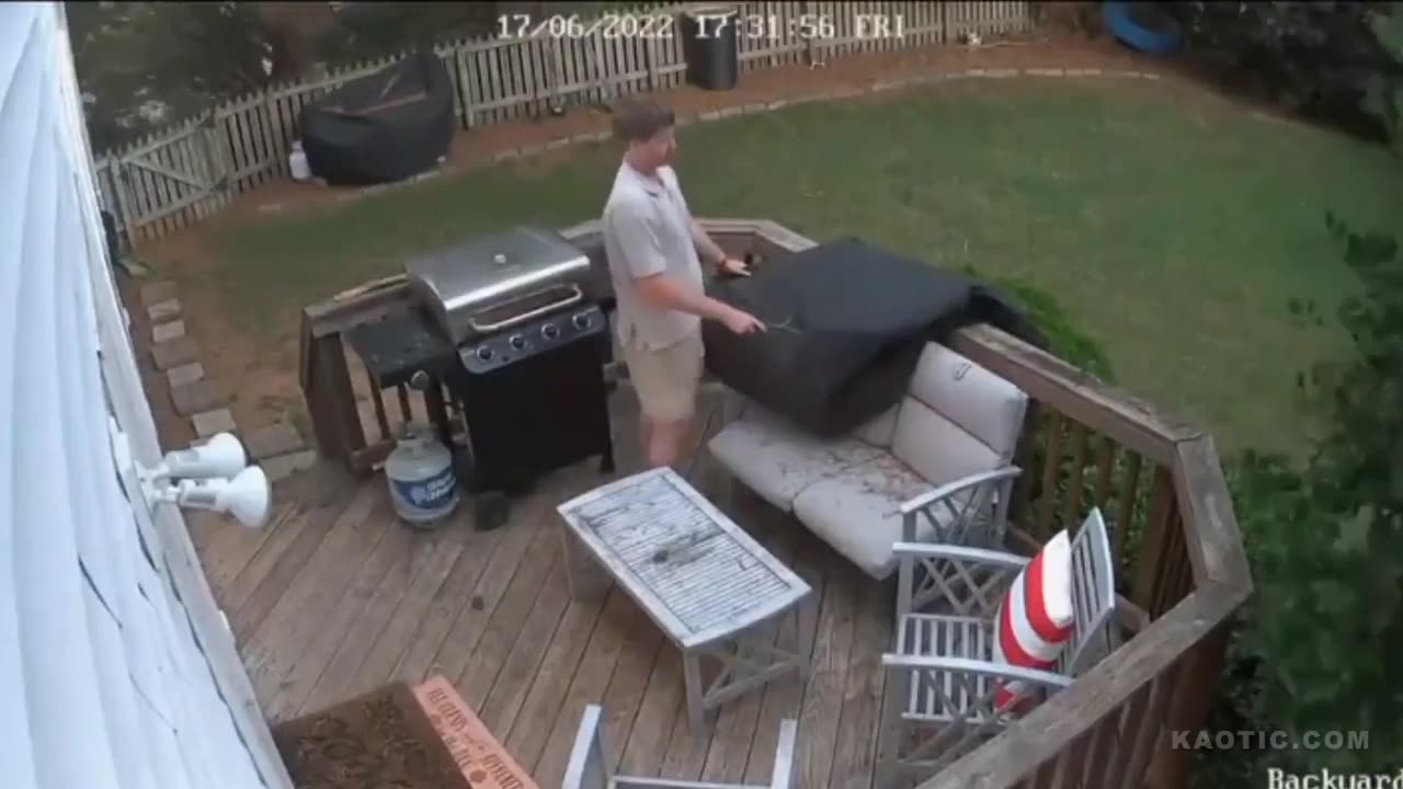 close calls- man trying to cook a bbq in high winds doesn't end well