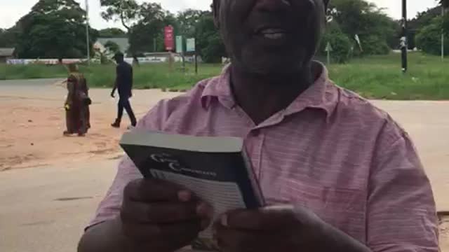 Zambian Man receiving The Great Controversy