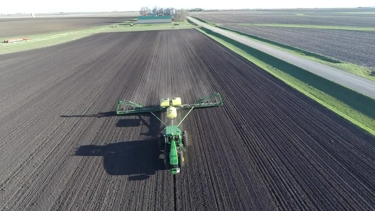 John Deere Tractor Plowing Field Clear Day