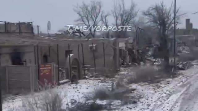 A convoy of Russian equipment drives through Popasna to the front
