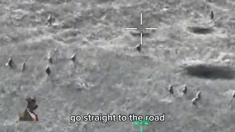 ~30 Ukrainian soldiers moving through an open field come under Grad MLRS fire